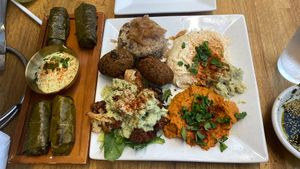 The Arabian Breeze Mezza (right) and the Veggie Grape Leaves (Left)  at Nicholas Restaurant in Gresham