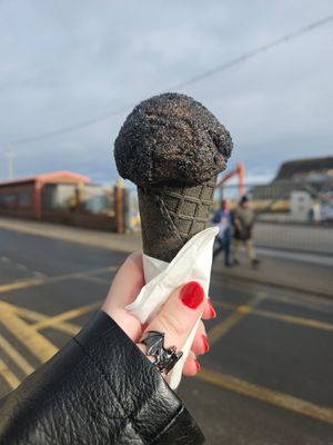 Black cone, plant based blood orange and chocolate ice cream, coal dust at Truly Scrumptious in Whitby