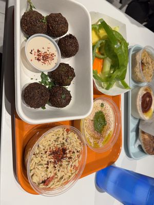 Falafel plate with orzo salad and veggies  at Sonny's Mediterranean in Denver