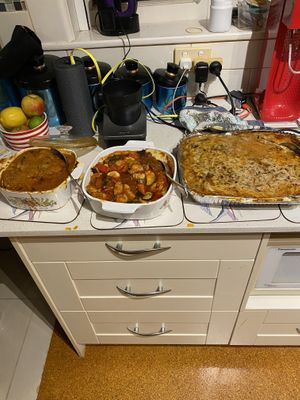 An eggplant moussaka and two other dishes  at Vege Rama - Adelaide St in Brisbane