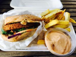 Satay burger with a side of chips and mayo  at Vege Rama - Adelaide St in Brisbane