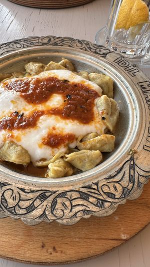 Vegan manti with garlic yogurt  at İdil Mantı Evi in Izmir
