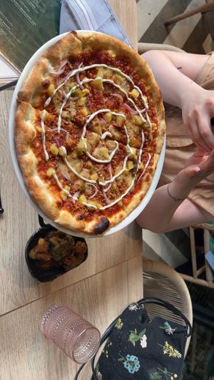 Hawaiian pizza (bang bang broccoli in the back)  at PLANTA  in Atlanta