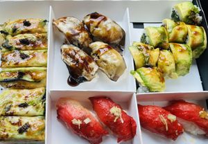 From left- torched & pressed, unagi (eggplant) sashimi, dragon (broccoli, spinach & avocado) roll, tuna (watermelon) sashimi.   at PLANTA  in Atlanta