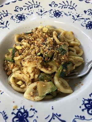 Fresh pasta with zucchini, zucchini flower and roasted pistachio    at Il Cormorano in Cala Gonone