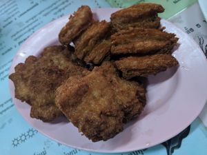 Fried chicken*, as a person who went vegan only a little while this SHOCKED me on how close this taste to pork (not chicken) with it's texture crisp and flavor. If you have a non v at Nong J - ร้านน้องเจ in Phuket