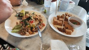 Fried rice and crispy tofu at Kin & Koff Café in Bangkok