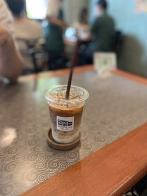 Iced oat milk latte  at Kin & Koff Café in Bangkok