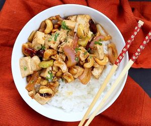 A delicious and very easy Asian stir fry featuring a rich sauce made with hoisin sauce, soy sauce, sesame oil and garlic. The cashews add a bit of a bite to contrast with the softness of the tofu. It goes best with white rice. at Fairy Tail - home-based meals & catering in Copenhagen