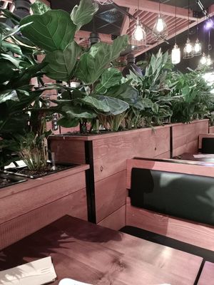 Interior seating facing counter at Frittenwerk - Alexa Mall in Berlin