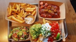 Fries, currywurst, loaded fries, salad at Frittenwerk in Mannheim