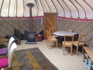 Inside the cosy yurt at The Green Place in Sileby