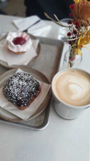 Vegan latte and chocolate bulle with caramel filling  at Socker Sucker in Stockholm