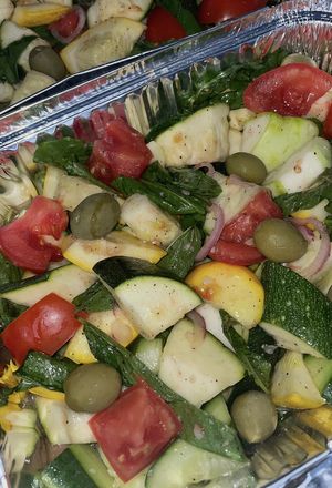 Vegan salad: patisson, yellow and green zucchini, spinach, fresh mint, tomatoes, cucumber, red onion, dressing (fresh squeezed lemon juice, garlic, olive oil, salt, black pepper) at Crust in Yerevan