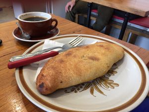 Vegan Calzone with Long Black at Crumbs Organic Bakehouse in Kensington