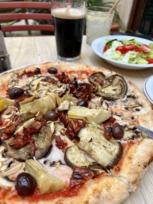 Pizza with vegan mozzarella and the mixed salad  at Coogi's Pizzeria & Bistrot in Mdina