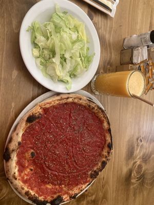 La rossa pizza and green salad   at Coogi's Pizzeria & Bistrot in Mdina