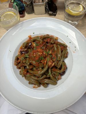 Spirulina pasta with aubergines and olives oil  at Coogi's Pizzeria & Bistrot in Mdina