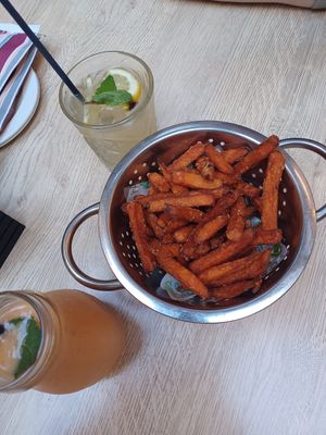 Sweet potato fries, passion fruit smoothie, lemonade at Coogi's Pizzeria & Bistrot in Mdina