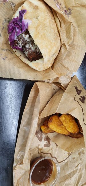 Original falafel sandwichr with fries at YAFFA Jean Mace in Lyon