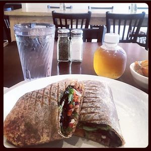 vegan bbq wrap with apple juice at Sunflower Cafe in Nashville