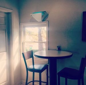 a high-top beside a window inside Sunflower Cafe at Sunflower Cafe in Nashville