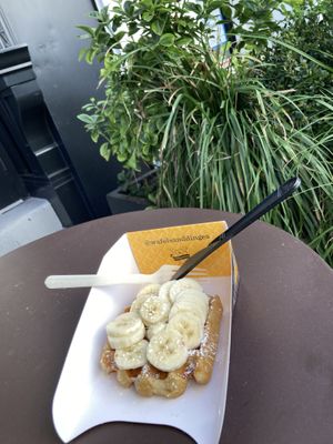 Waffle with banana topping at Wafels & Dinges in New York City