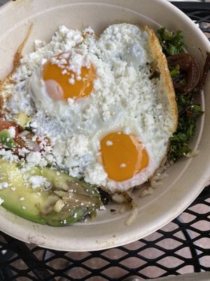 Pura vida bowl with added goat cheese and avocado  at Green Sage Cafe - South in Asheville