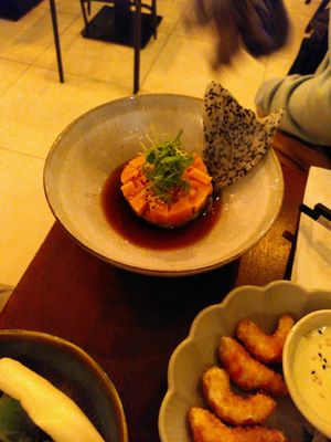 Salmon tartar with rice sesame cracker at Soy Club in Stuttgart