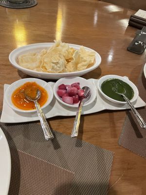 Papa dams and chutney as you peruse menu.  at Queen's Tandoor in Jakarta