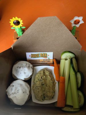 Vegan, gluten-free chia muffins and the spicy kale hummus snack pack at Juice Bar in Orlando