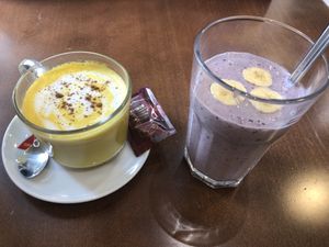 Golden latte and seazonal smoothie   at Mela Canela - Sintra Centre in Sintra