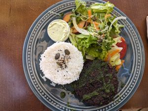 Burger with rice and salad at Mela Canela - Sintra Centre in Sintra