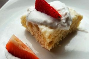 Vegan tres leches cake with strawberries and coconut cream. at Zephyr Winebar + Café in Marquette