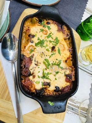 Moussaka of tofu, zucchini, tomato and olives (delicious)  at The Crazy Family in Burgas