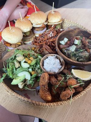 Share platter- sliders, carbonara, fries, salad and 'see-food’  at La Gula By The Hungry Tapir in Kuala Lumpur