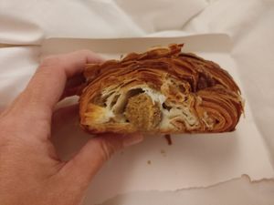 Inside the cheez sausage with croissant at La Gula By The Hungry Tapir in Kuala Lumpur