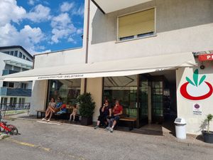 Outside, some benches to sit at AiJOO Eismanufaktur  in Naturno