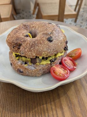 Local Wild Mushroom Sourdough Toast with homemade turmeric hummus in a blueberry bagel at Wanaka in Hong Kong Island
