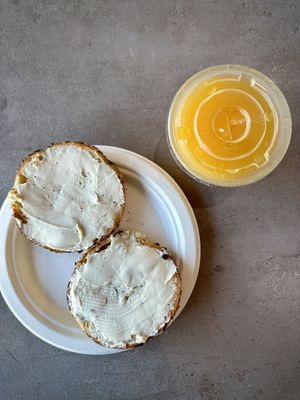 Toasted Bagel, Cream Cheese and OJ  at Manhattan Bread & Bagel in Manhattan Beach