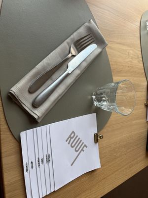 Menu and table setting. Nice linens  at RUUF in Schaan