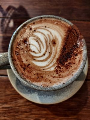 Hot chocolate on oat at Sweet Bones Bakery Cafe in Scullin