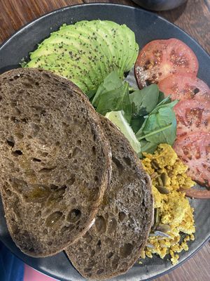 Avo toast with added tofu scramble at Sweet Bones Bakery Cafe in Scullin