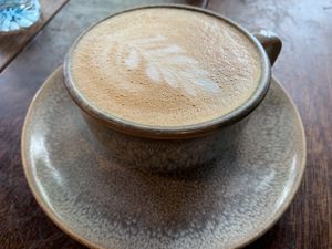 Oat flat white  at Sweet Bones Bakery Cafe in Scullin
