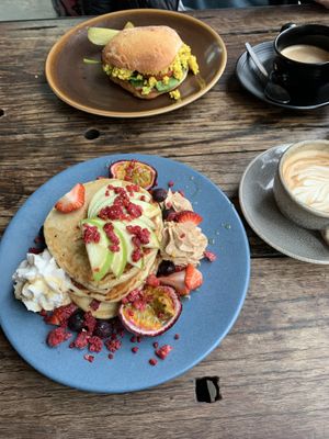 This morning’s blueberry pancakes. And Brekky Burger.   at Sweet Bones Bakery Cafe in Scullin