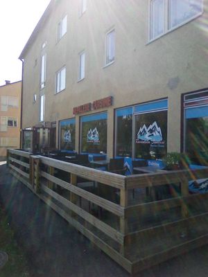 Entrance and outdoor seating at Restaurant Sunkosi in Helsinki