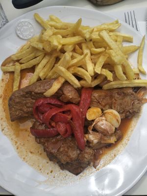 Seita a la portuguesa. Delicious. Big plate. Also had a latte with soy milk. They didn't have vegan desserts though at Sunset Beach in Sao Miguel