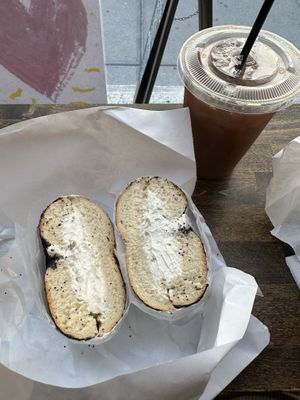 Poppyseed bagel with scallion tofu spread  at Tompkins Square Bagels in New York City