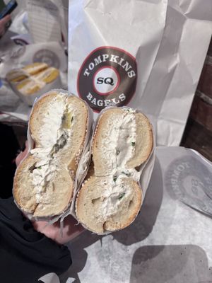 salt bagel with spinach and artichoke cream cheese   at Tompkins Square Bagels in New York City
