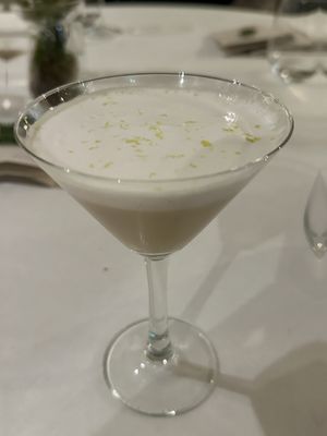 Seventh course drink: caramel oat based drink with citrus foam  at Vannu in Breda